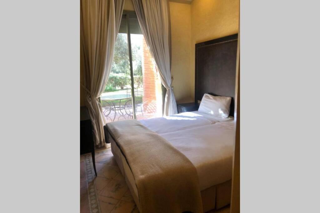 Appartement Bel Au Rez-de-jardin Dans La Palmeraie *